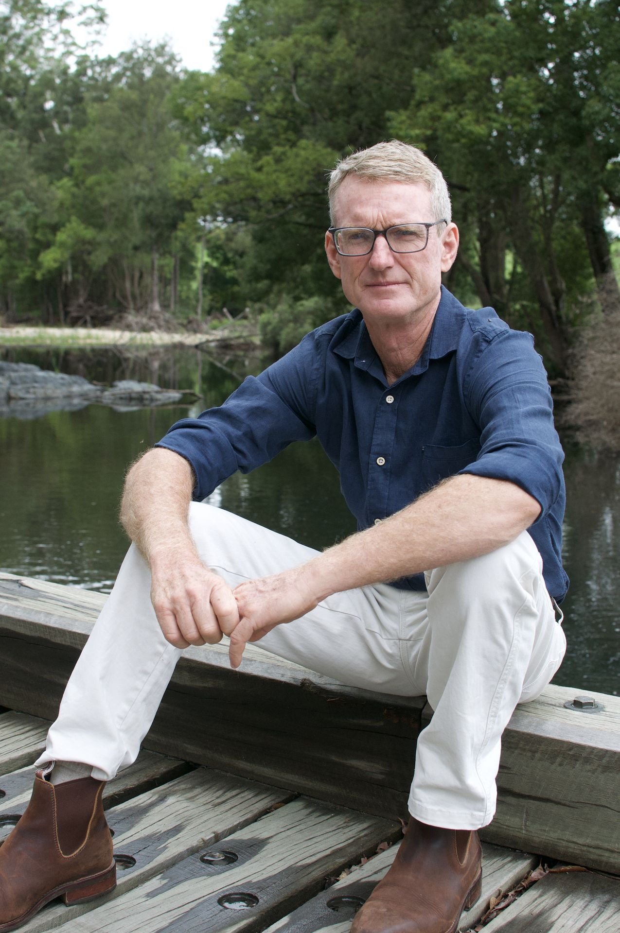 Rod Bailey seated and posing for camera